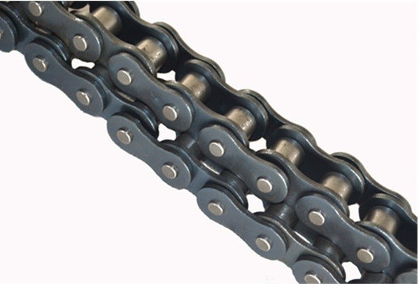 A method for removing carbon and grease from a transmission chain