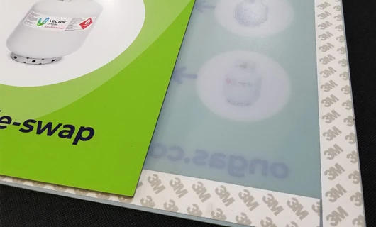 Attaching the 3M tape to printed plastic sheet
