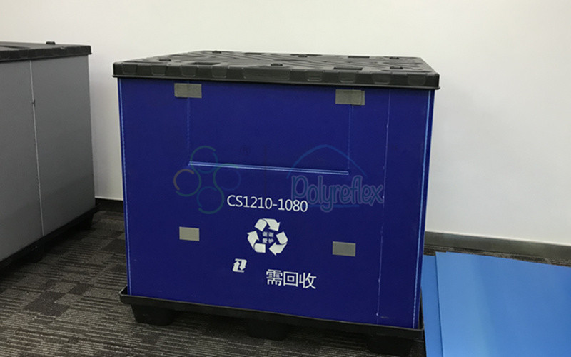 Blue pallet container with custom printing