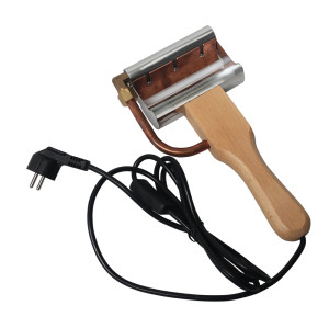 Electric uncapping planer for cutting off the wax layer
