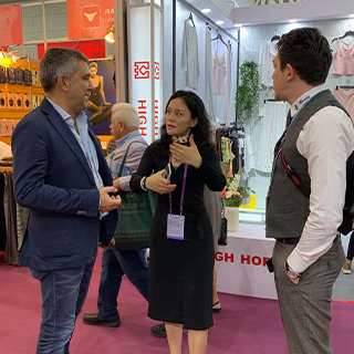 Tianjie Lingerie team meeting buyers at an international trade fair
