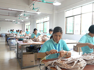Sewing operators working on lingerie production lines