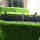 Artificial grass with rubber safty tiles