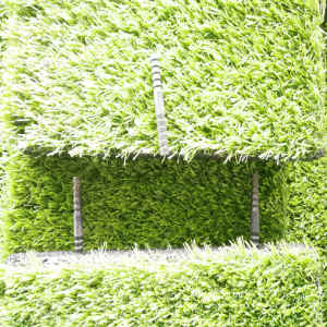 Artificial grass with rubber safty tiles