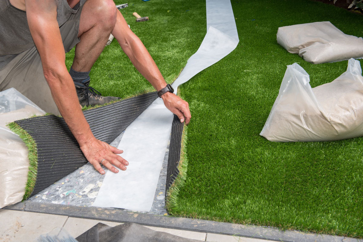 cutting artificial turf