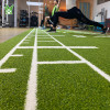 Césped artificial personalizado para gimnasio | Césped verde para gimnasio | Fabricante de pisos de césped para gimnasios