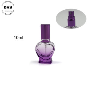 Botella de perfume en spray de vidrio en forma de corazón