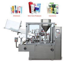 Tube filling and sealing machine