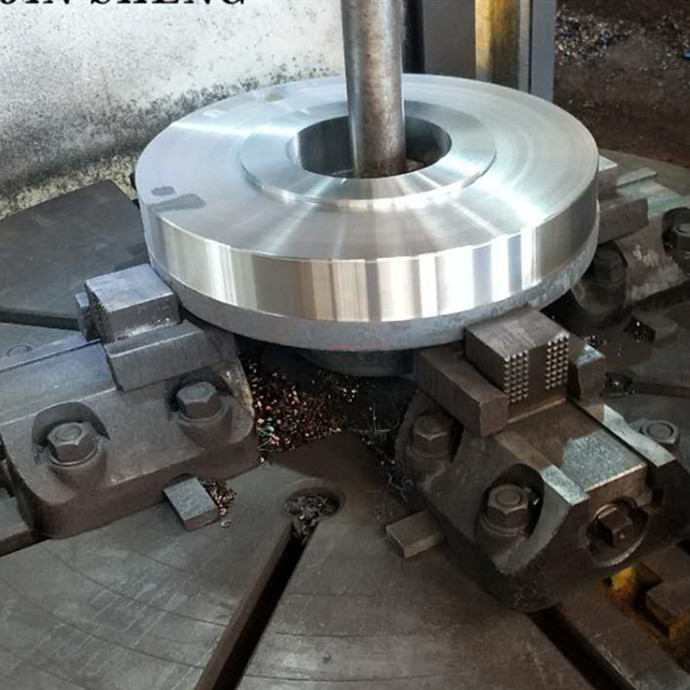 Lathe machine processing of threaded flanges