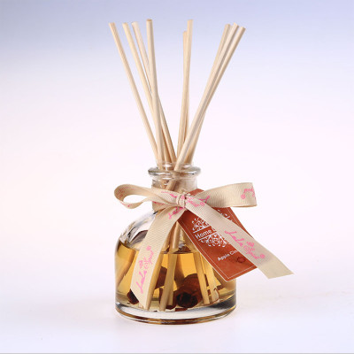 China supplier natural aroma essence oil glass bottle reed diffusers with rose rattan stick wholesale