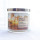 Natural three wick fruit flavour soy wax scented candles placed in colorful glass jars