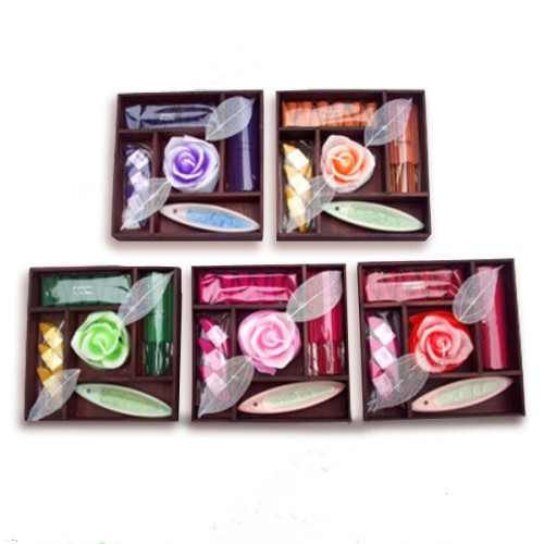 Red heart shaped candles and incense cones and sticks for gift set