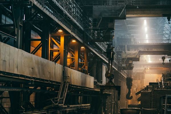 Interior of large industrial steel factory with continuous casting equipment