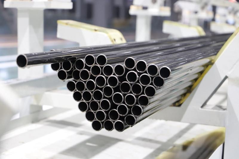 ERW tube mill producing welded steel pipes on a factory production line