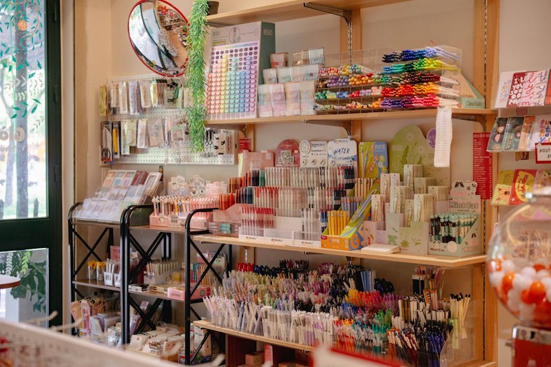 Art supplies store interior with shelves of creative materials