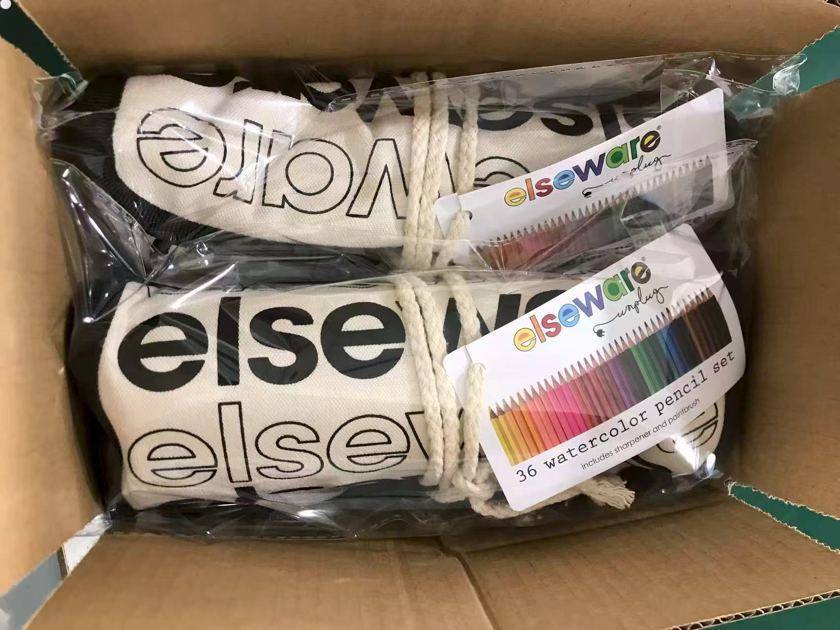 Packaged watercolor pencil wraps prepared for shipment
