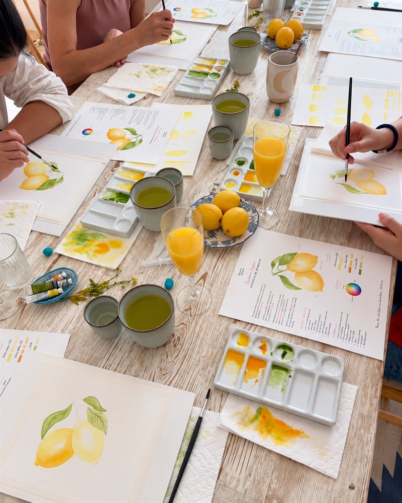 Watercolor painting workshop at a shared table