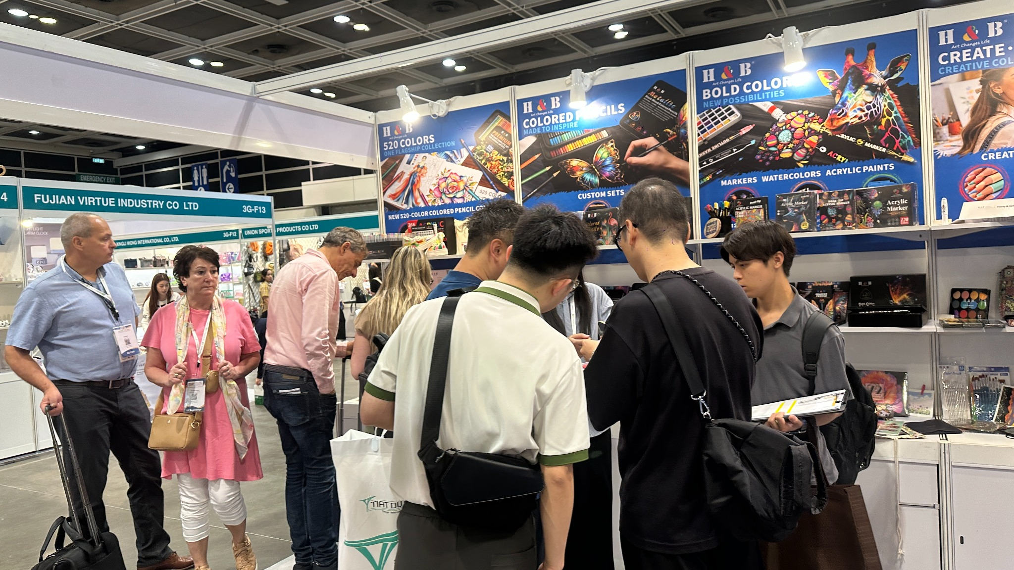 H&B Art team and visitors discussing products at MEGA SHOW 2026