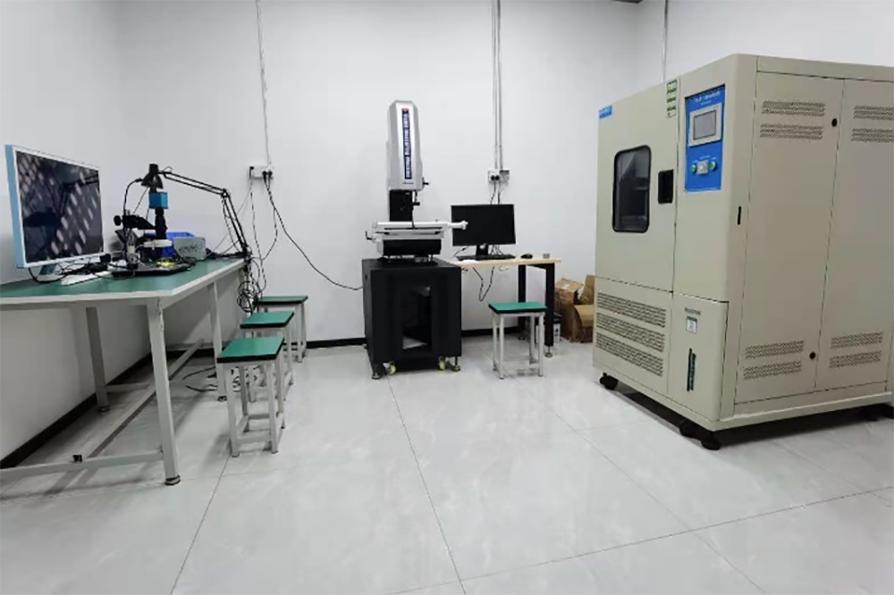 JEET industrial borescope manufacturing facility showing assembly line, calibration laboratory, and quality control testing stations