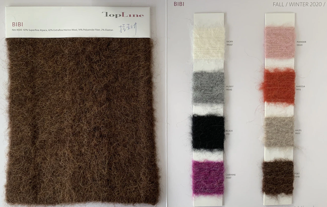 47%Superfine Alpaca 42%Extrafine Merino Wool 14%Polyamide 2%Elastan Fancy Yarn