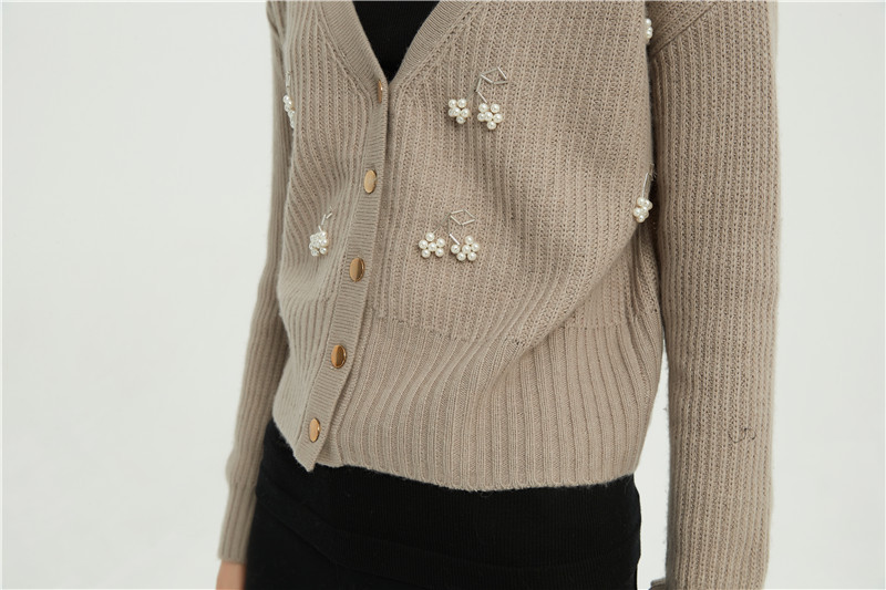 sweater with simulated pearls