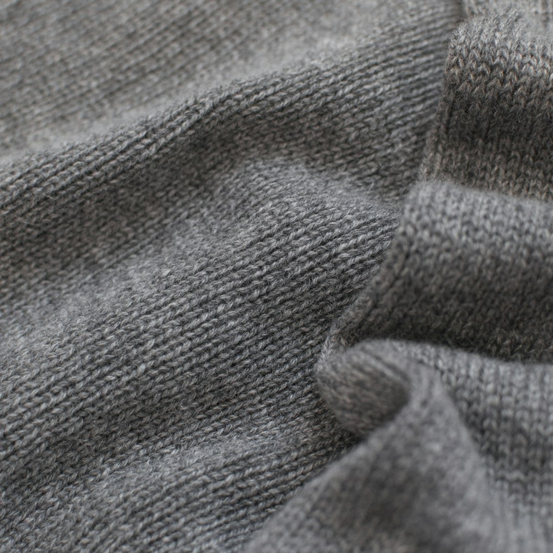 Soft grey cashmere sweater close-up