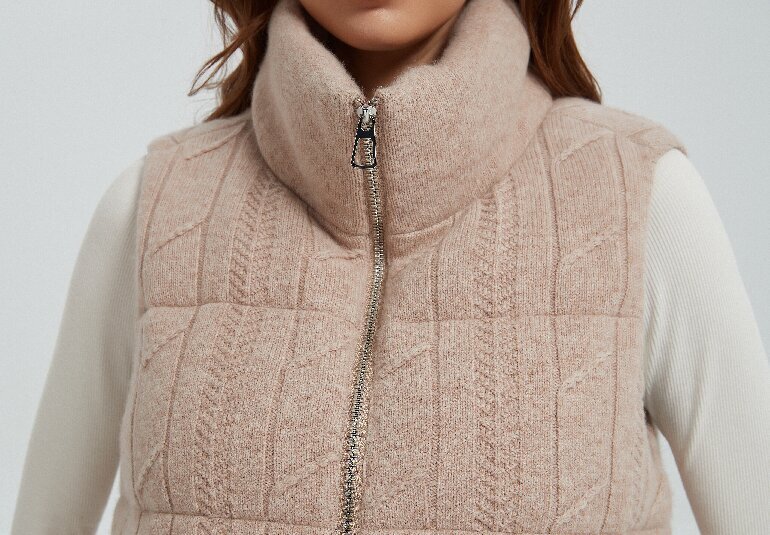 Stand collar and zip construction detail on cashmere outerwear