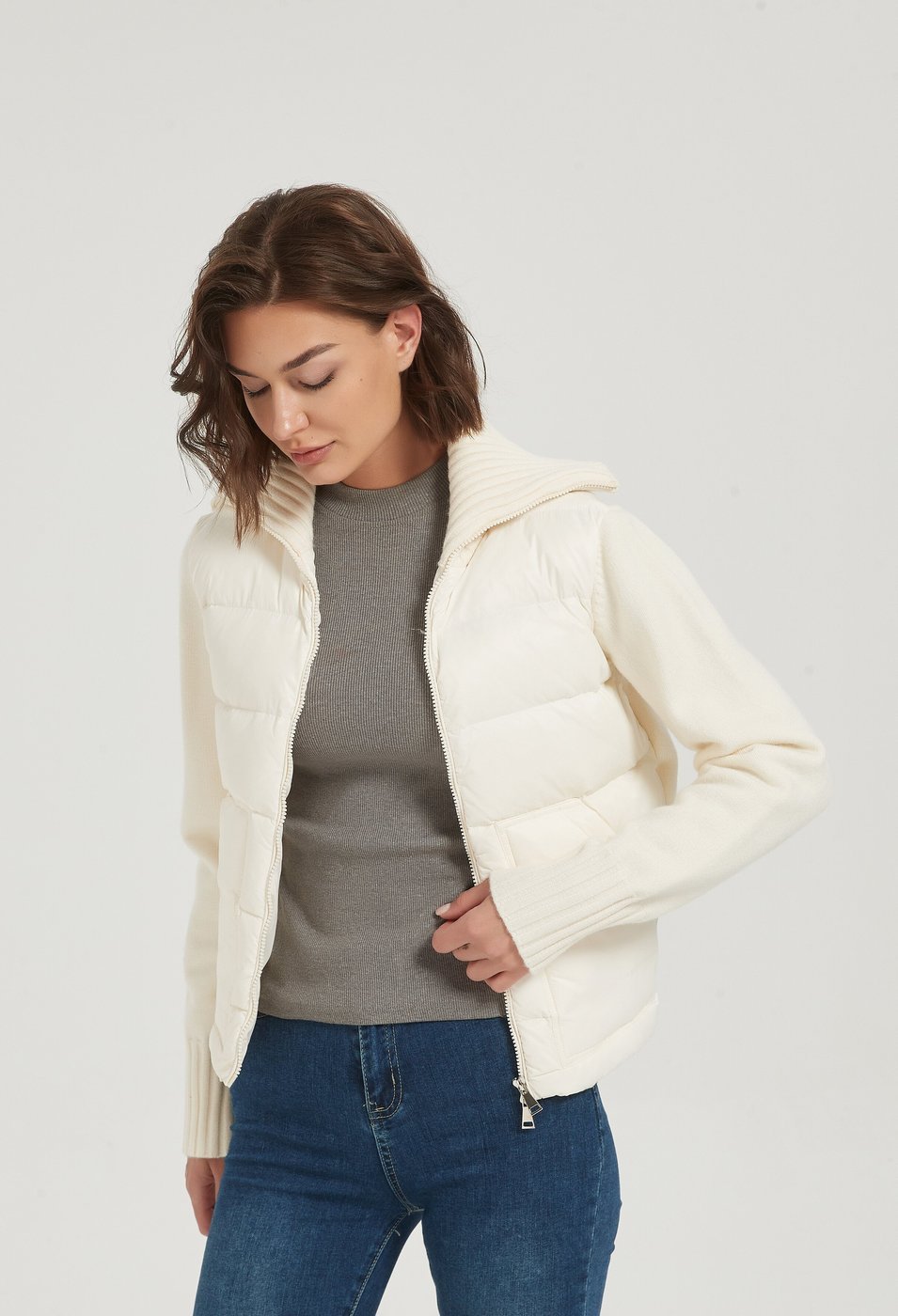 Ivory knit-and-shell cashmere jacket on a model, open front