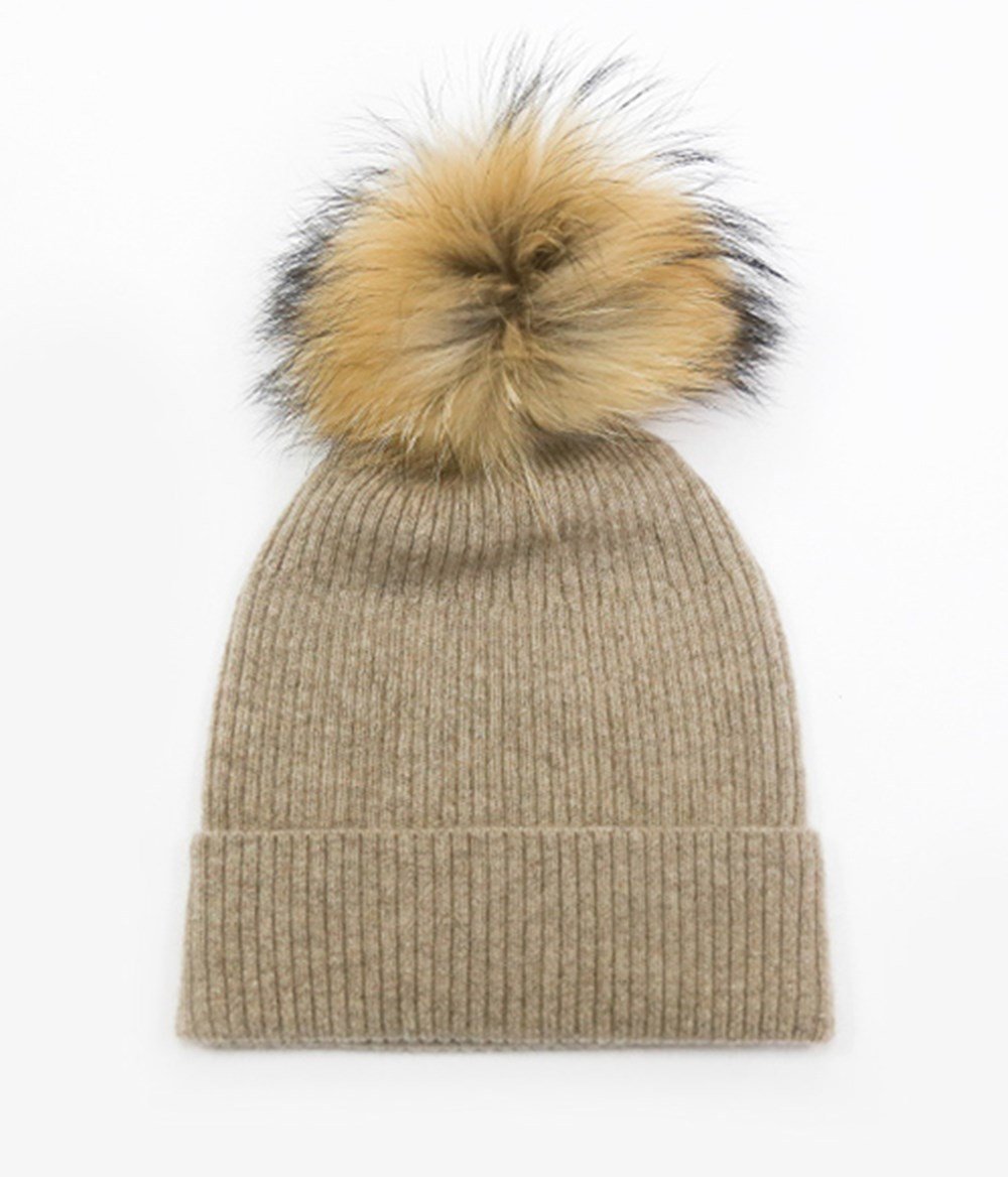 Tan ribbed cashmere beanie with a fur pompom
