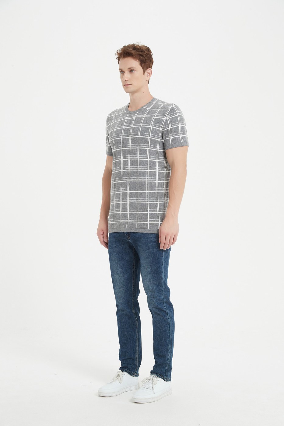 Man wearing a grey checked short-sleeve cashmere knit with a fine gauge pattern, front view