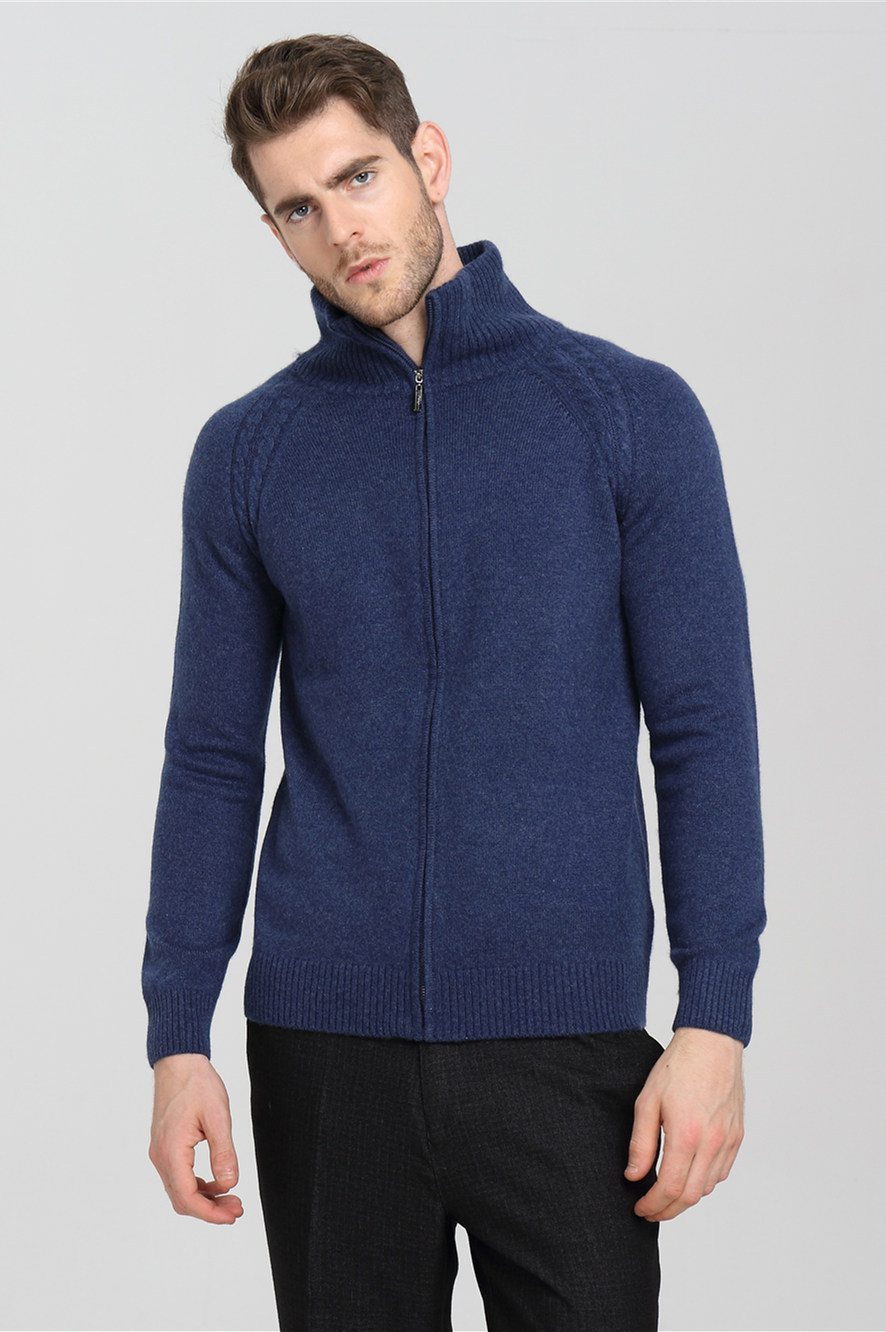 Man wearing a navy full-zip cashmere knit jacket with a stand collar
