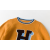 OEM factory boy cashmere word pattern round neck sweater with strip wholesale