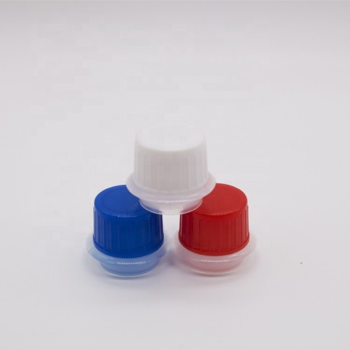 Multi-color plastic closure cap for lubricant spray