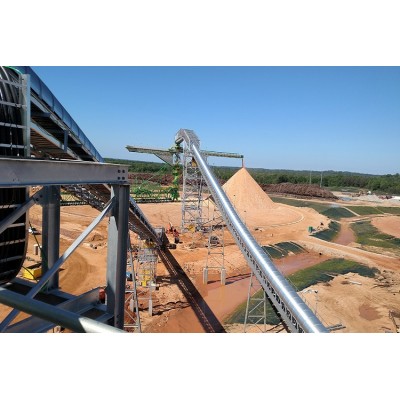 Stationery design radial belt conveyor solution for rock, sand, dirt and gravel