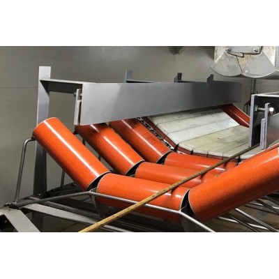 Groove type idler for belt conveyor