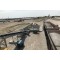 Loading and unloading belt conveyor system for railway station transportation