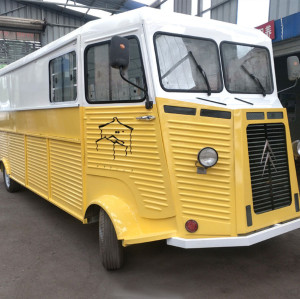 citroen retro food truck in bright yellow color large room for business