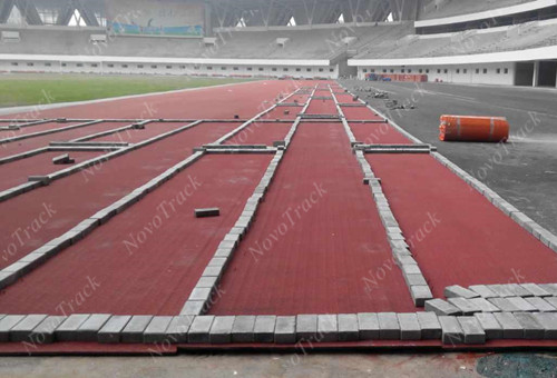 athletics track roll installation