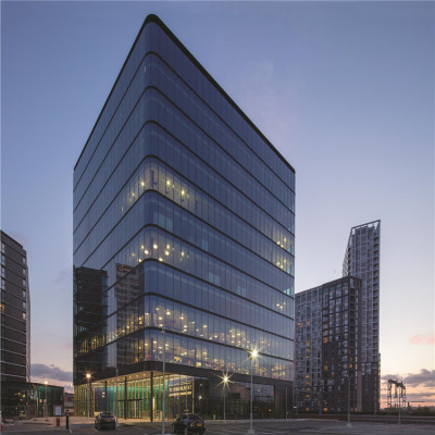 Metal - coloured aluminium veneers decorate the outer walls of office buildings