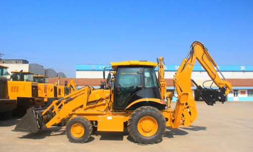What is the cause of the failure of the boom at backhoe loader