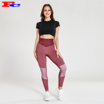 Vente en gros de vêtements de yoga avec des t-shirts courts noirs et des leggings sans couture