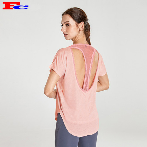 Abbigliamento da allenamento all'ingrosso T-shirt con retro in rete a forma di T rosa chiaro e leggings grigio scuro