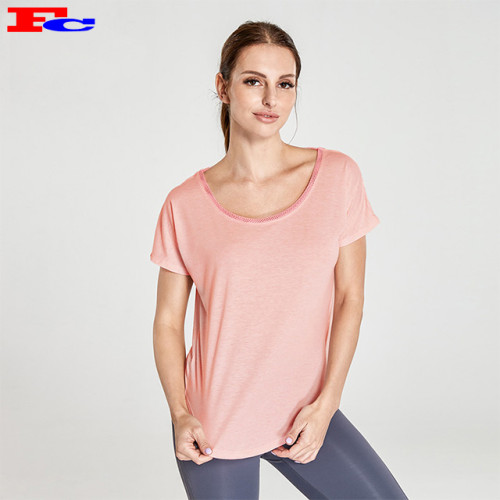 Großhandel Workout Kleidung Hellrosa T-förmige Mesh Back T-Shirt und dunkelgraue Leggings