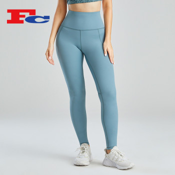 OEM Women Yoga Pants In Bulk Peach Hip Lift Design Leggings Supplier