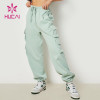 HUCAI Custom Cargo Pockets Cool Stylish Women Sweatpants Sportswear Supplier