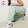 HUCAI Custom Cargo Pockets Cool Stylish Women Sweatpants Sportswear Supplier