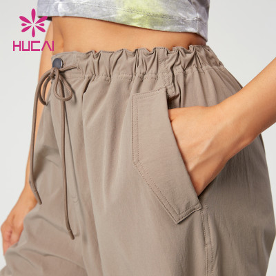 HUCAI OEM Sports Joggers Drawstring Design Light Quick-Drying Fabric Gym Pants Supplier