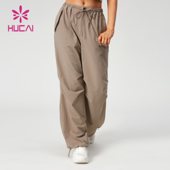 HUCAI OEM Sports Joggers Drawstring Design Light Quick-Drying Fabric Gym Pants Supplier