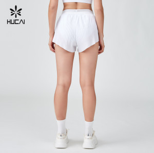 HUCAI Sportswear Manufacturer OEM Ladies Split Hem Pleat Back Mesh Waistband Sports Shorts