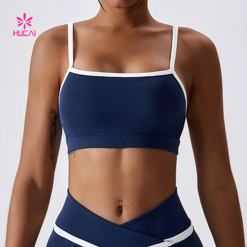 Contrast trim sports bra with controlled binding width and a stabilized underbust band